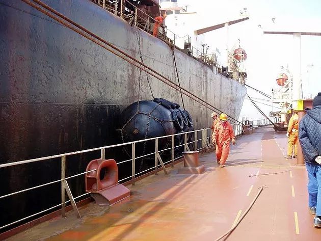 Burmese sailors working on the ship