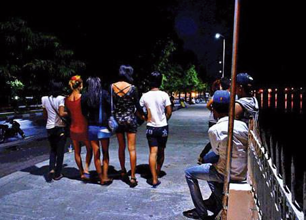 Men mocking transgender women on the road at night